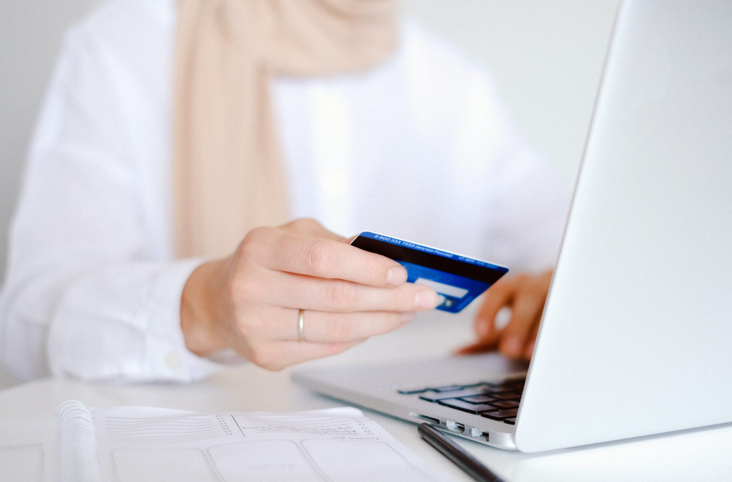 a woman having a credit card for super contribution